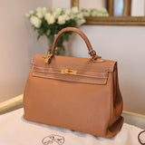 Hermes Kelly 35 Retourne Togo Leder Gold Hardware Gold