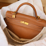 Hermes Kelly 35 Retourne Togo Leder Gold Hardware Gold